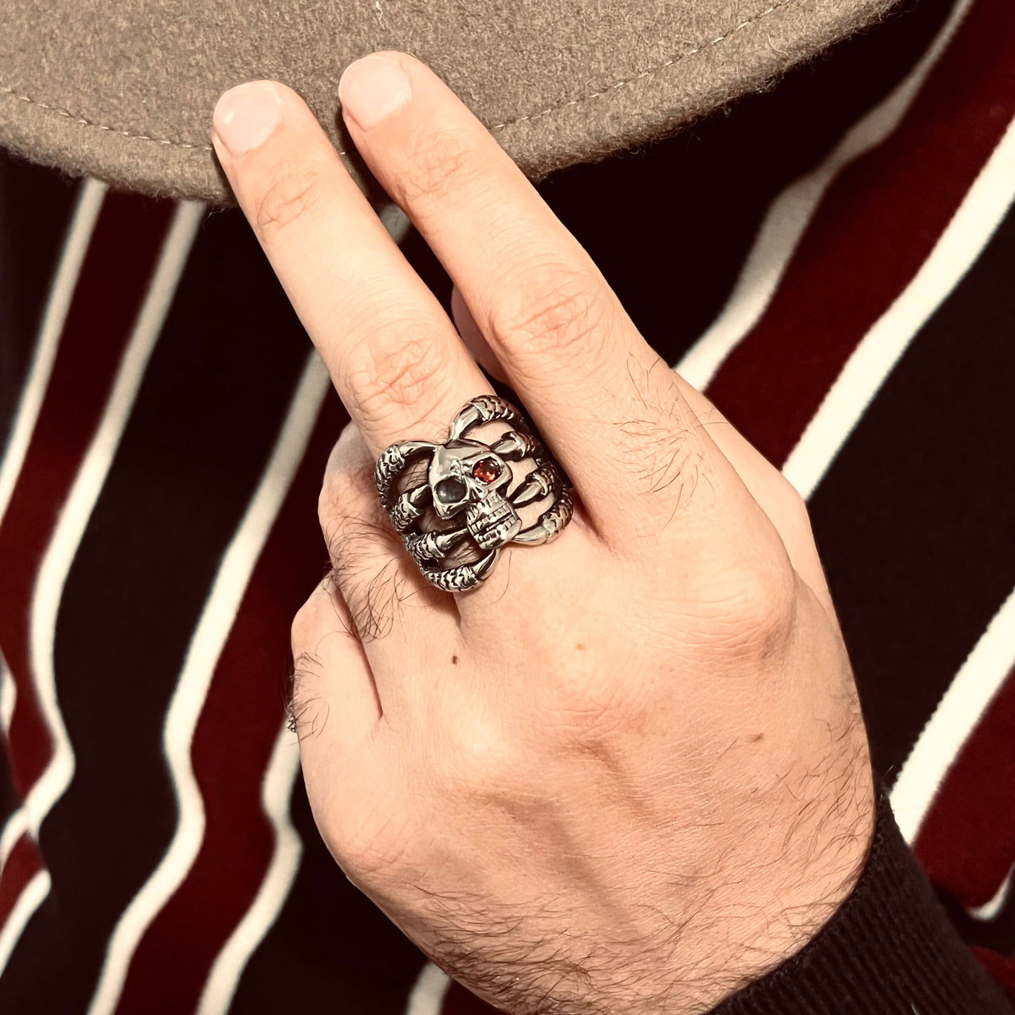 Stainless Steel Dragon Claws Holding Red CZ Eyed Skull Ring